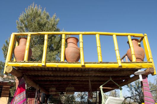 Balcony with mud containers