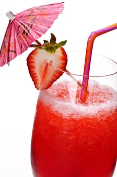 Strawberry daiquiri in glass isolated on white background with umbrella