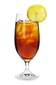 Glass of cold iced tea with ice and lemon