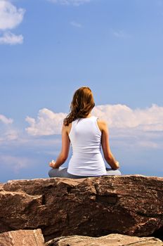 Portrait of young teenage girl doing yoga