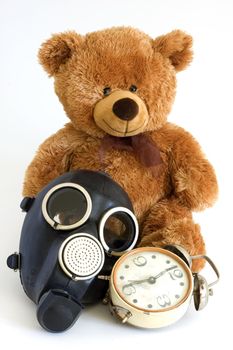 The Nursery toy, gas mask, old watch on white background.