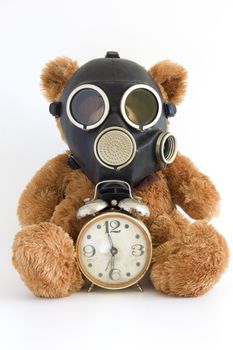 The Nursery toy, gas mask, old watch on white background.