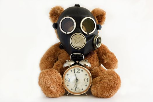 The Nursery toy, gas mask, old watch on white background.
