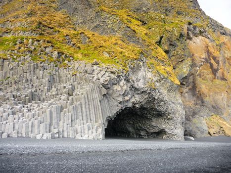 Scenic view of basalt cave or cavern on mountainside.
