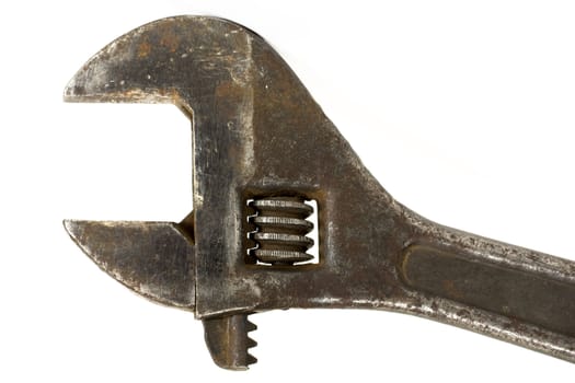 Old spanner on a white background.