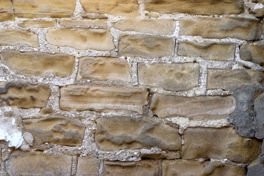 Old wall from a grey stone.