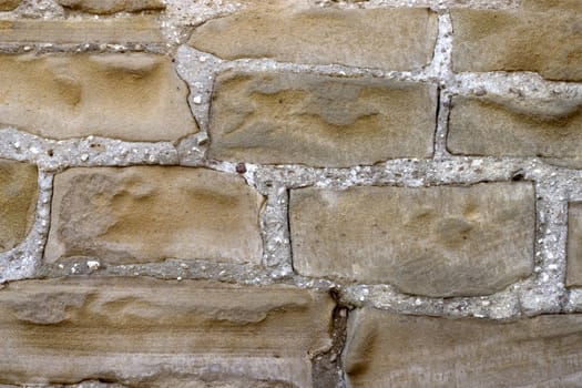 Old wall from a grey stone.