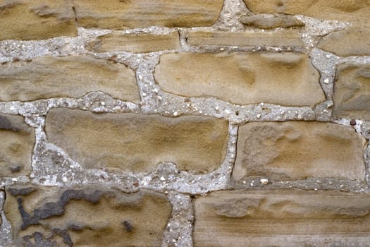 Old wall from a grey stone.