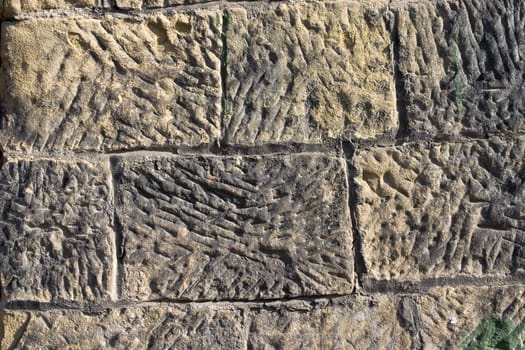 Old wall from a grey stone.