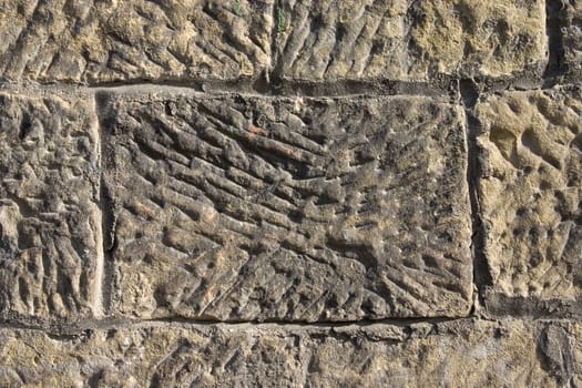 Old wall from a grey stone.