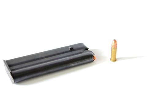 Isolated .22 caliber bullet with clip