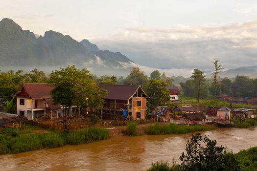 Village and mountain in Vang Vieng, Laos