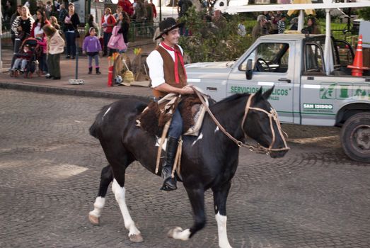 Argentina - Buenos Aires - May 15, 2012: gaucho to horse during the celebration of san isidro farmer in the province of Buenos Aires.