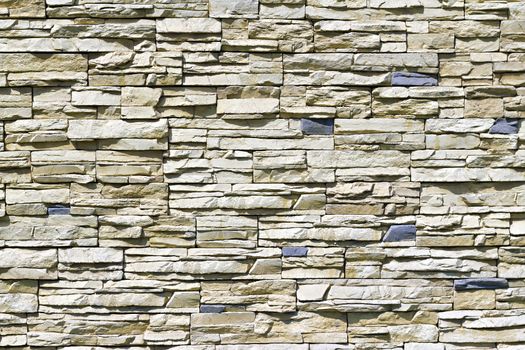 wall of rough stones in the background