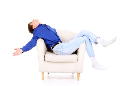 happy teenager relaxing in a chair. isolated on the white background