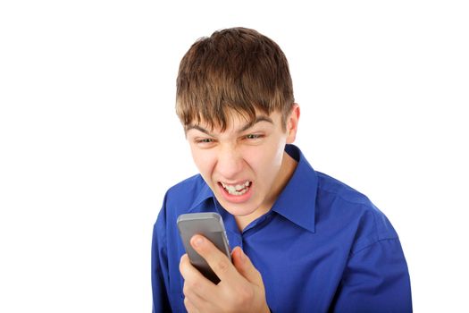 The angry teenager shouts in a mobile phone. isolated on the white background