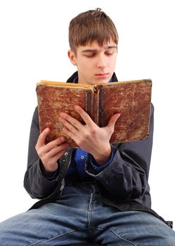 teenager reads old book isolated on the white background