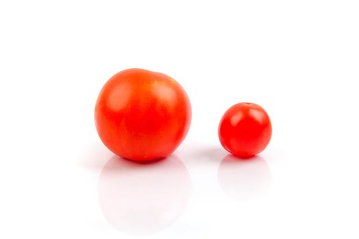 small and big tomato isolated on the white background