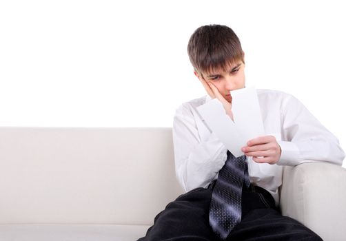 pensive teenager looking on the blank torn paper. isolated on the white background