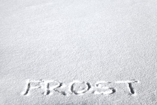 Handwritten Inscription "Frost" on the Snow