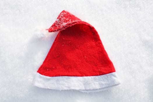 Santa's hat lying in the snow