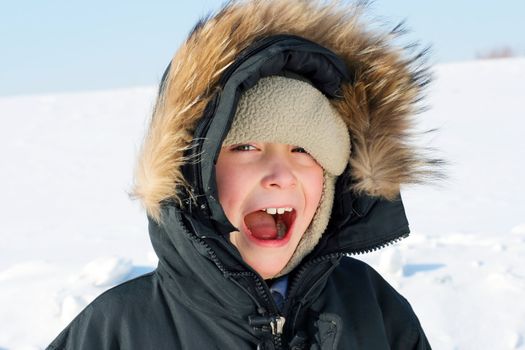 Portrait of Screaming Boy in the Winter