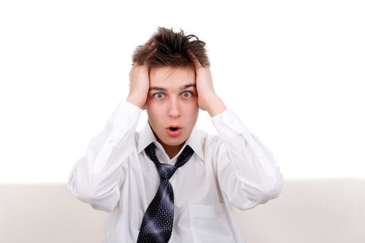 Shocked Teenager Isolated on the White background