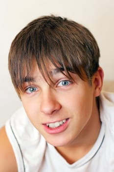 Cheerful Teenager portrait on the White background