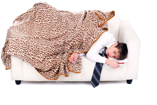 Tired Teenager sleeping on the Sofa with his books