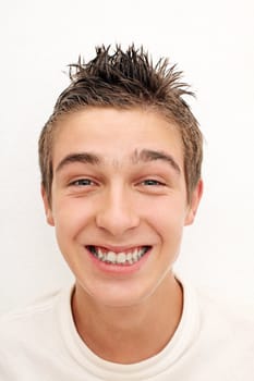 Cheerful Young Man Portrait on the White Wall background