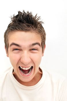 Furious Young Man on the White background Closeup