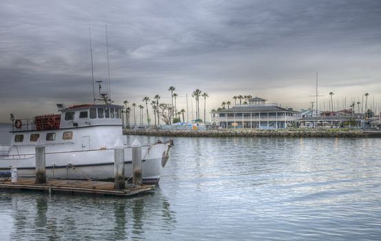 HDR landscape of commercial fishing boat at Alamitos Bay in Long Beach, California