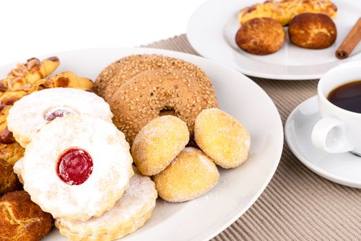 Assorted pastries and a cup of coffee.