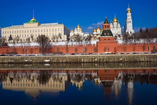 The red brick walls of famous Kremlin in Moscow with its churches