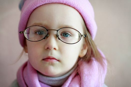 beautiful girl in hat and glasses