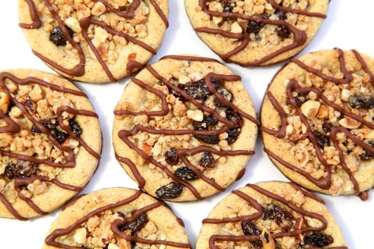 healthy dietary cookies with grain and dry fruits on white background