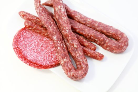 traditional Dutch sausages made of dry meat on white