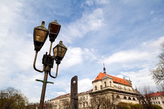 old lantern over blue sky on Svobody ave in Lviv city