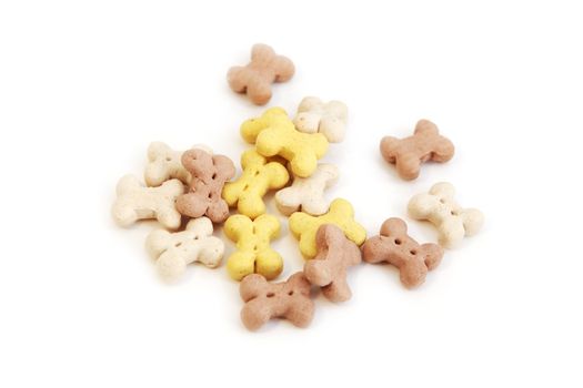 small colorful bones - cookies for dogs on white background