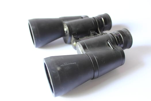Isolated black binoculars.