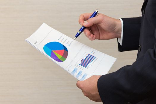 Business man reading a document.