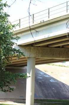 Underside of a bridge at a park.