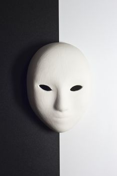 plaster mask in studio, when compared to the good or bad.