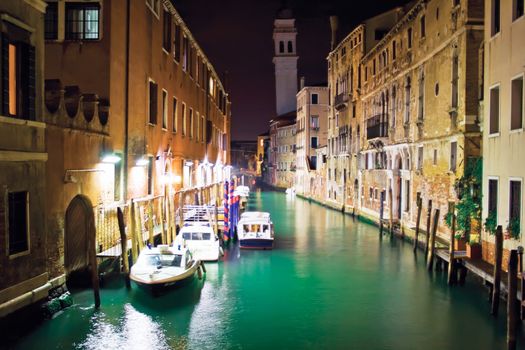 Water police boats in Venice at night