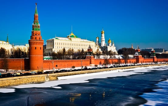 The red brick walls of famous Kremlin in Moscow with its churches