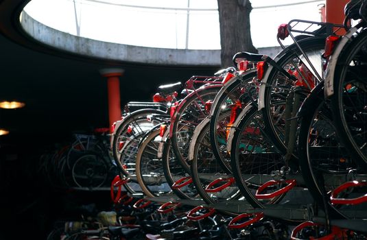 many bicycles at underground bikes parking