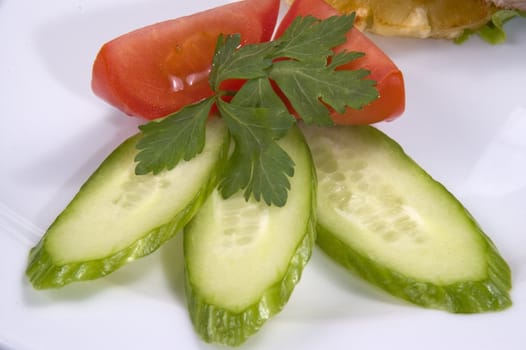 Close-up of salad. Cucumber and tomatoes.