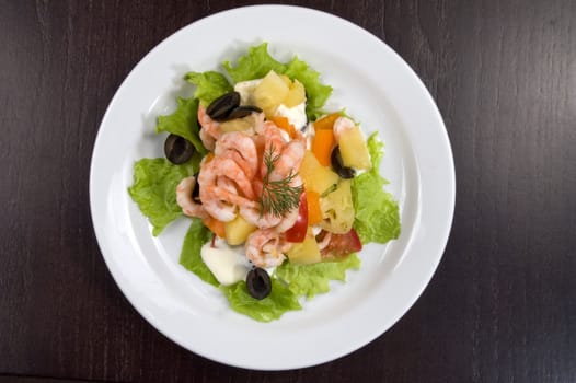 Prawn salad. Simple and healthy salad of shrimp, mixed greens, red  pepper and olive.