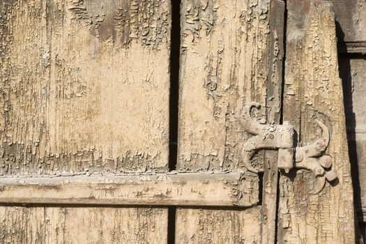 Old metal details on an old board.