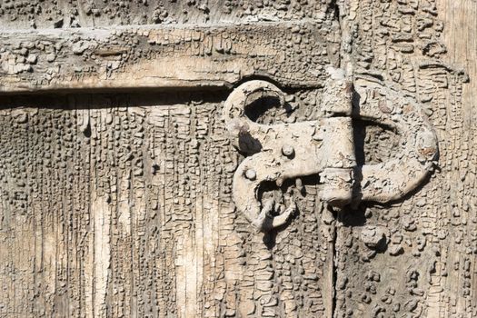 Old metal details on an old board.